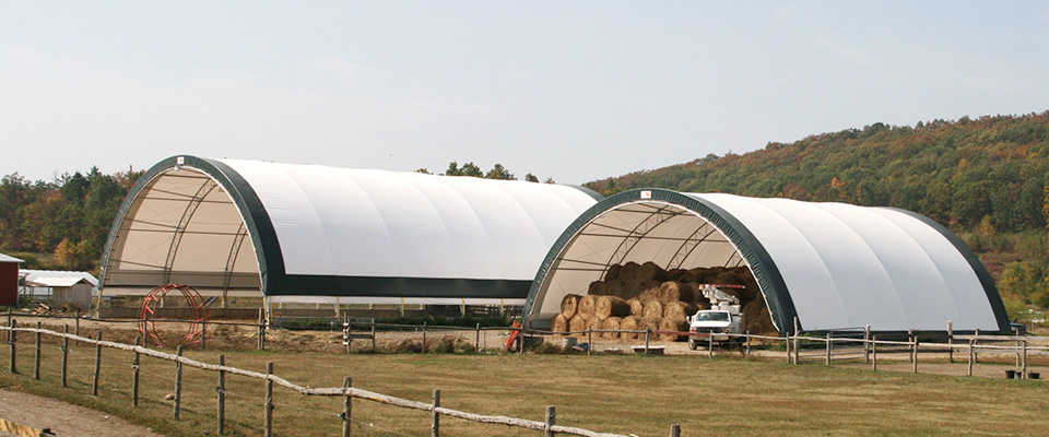 Fabric hay storage building