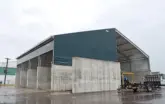 fabric structure with concrete building foundation