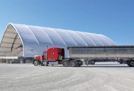Side view of A fabric building used for sand and salt