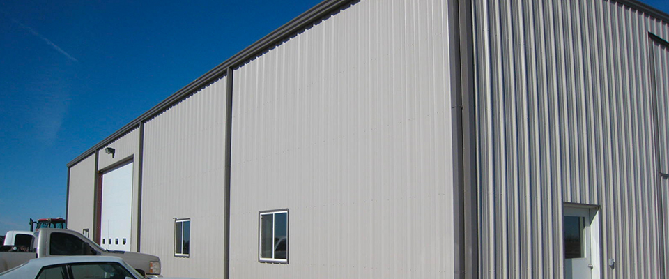 Grey metal building with windows