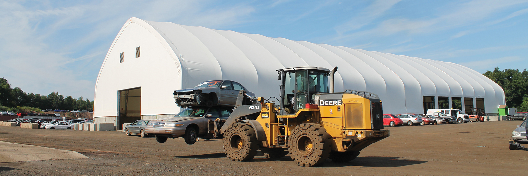 Car Junkyard and Car workshop under a white fabric structure