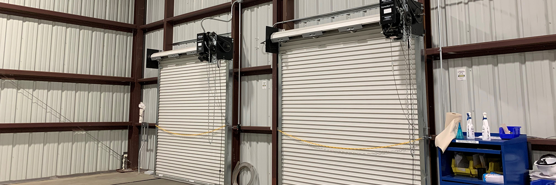 Beam building with doors