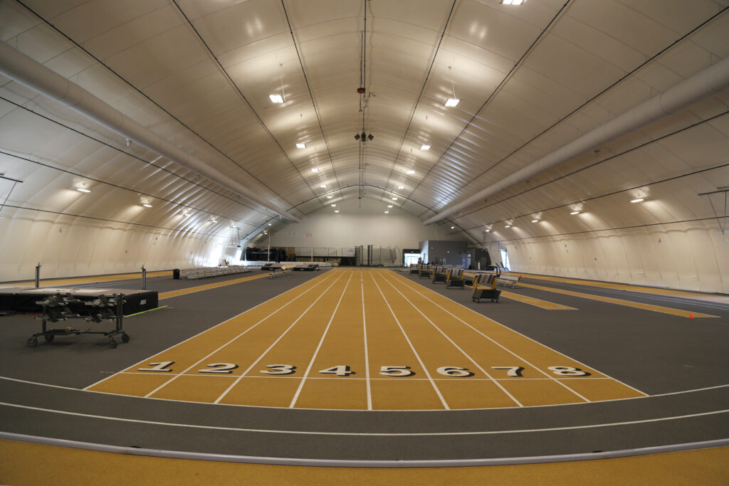 running track inside fabric athletics building