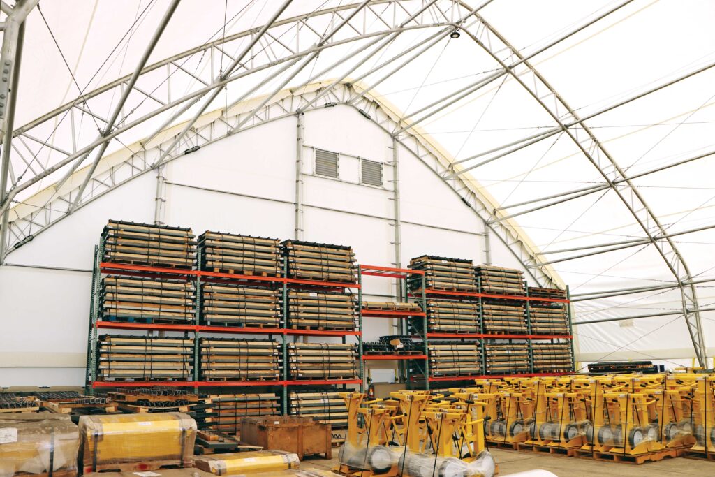 equipment and goods being stored inside storage tent