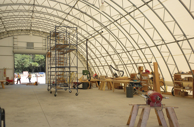 inside fabric structure at lumber yard