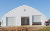 fabric building with garage style doors