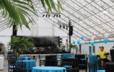 event with tables under fabric structure