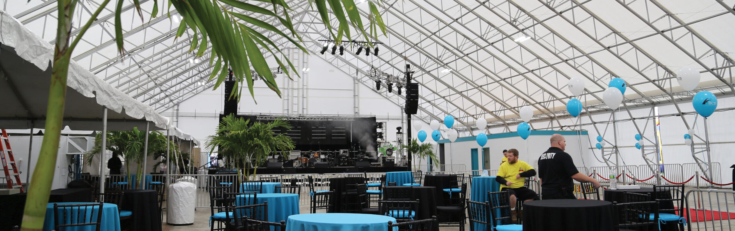 event with tables under fabric structure