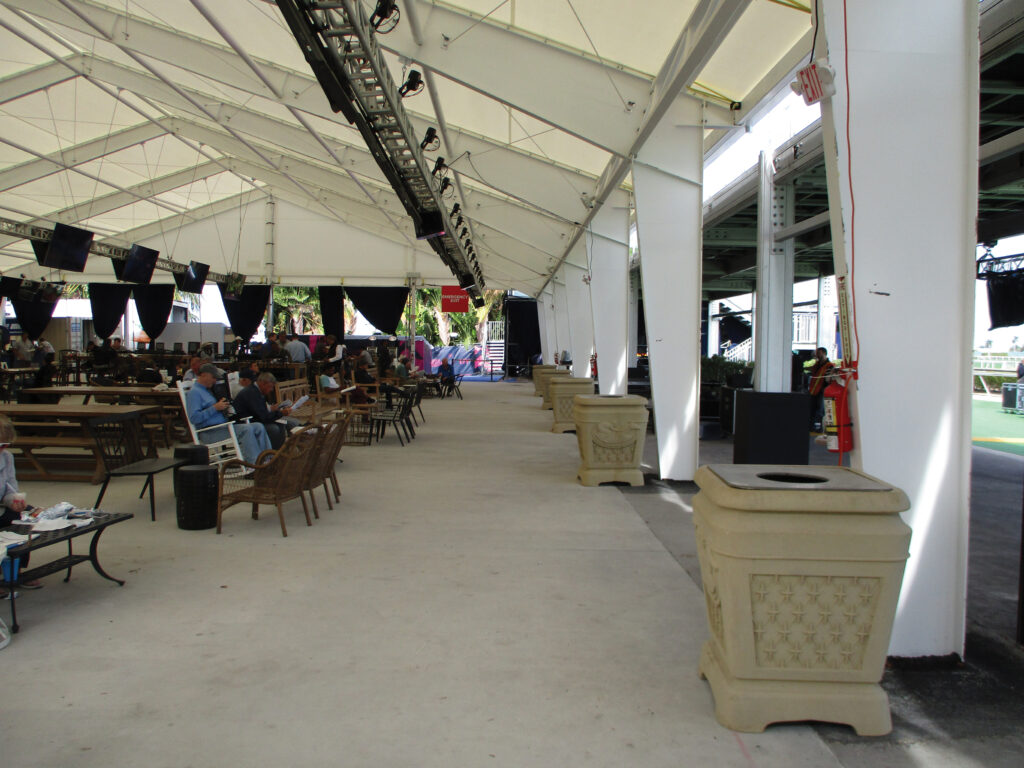 tables and guests under an I-beam fabric structure