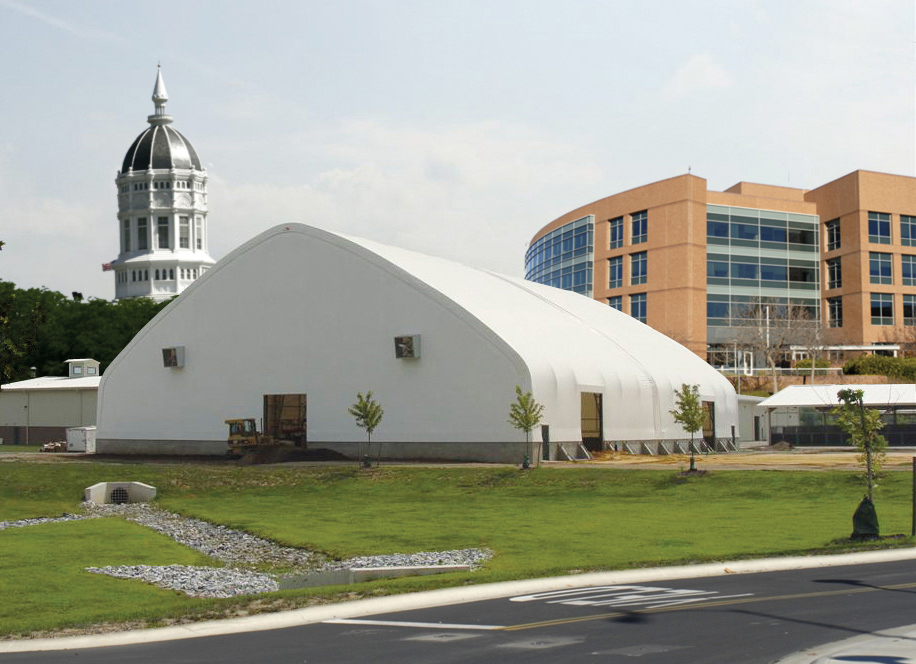 fabric structure with school in background