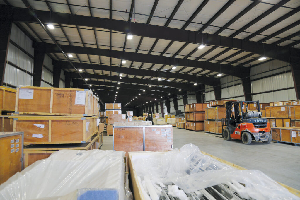 I-Beam metal building interior with stored boxes