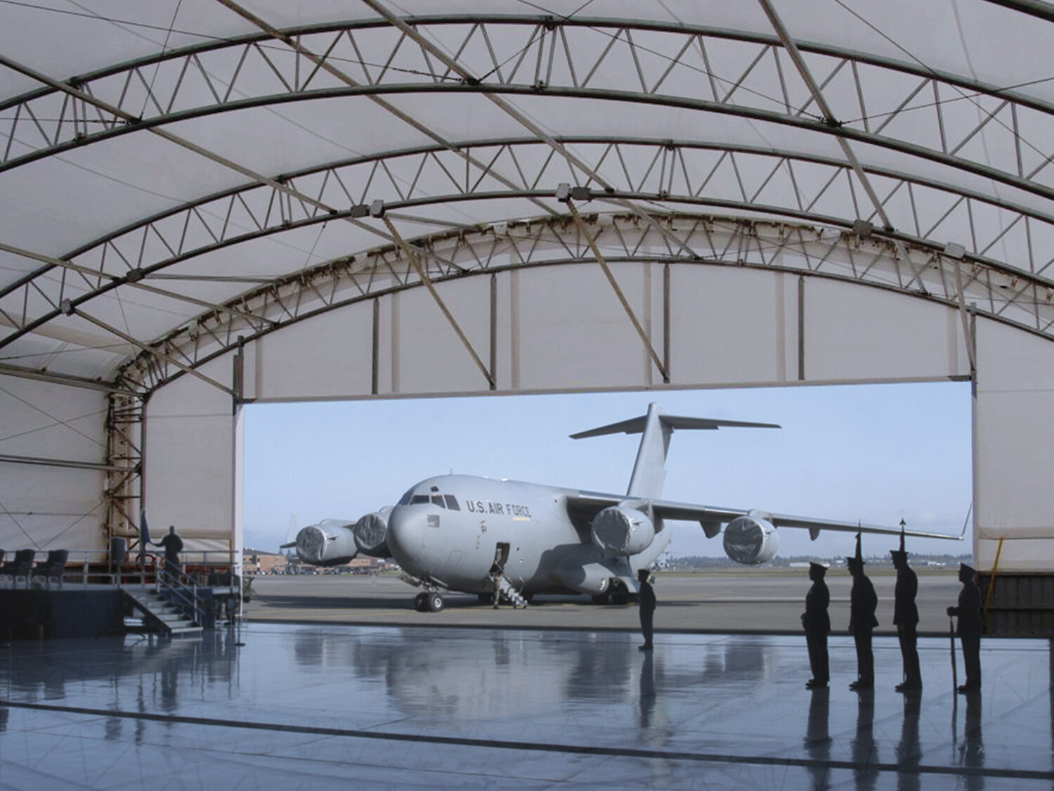 plane parked outside of plane hangar