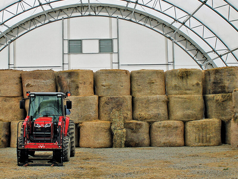 Hay Fabric Storage Building with red tractor