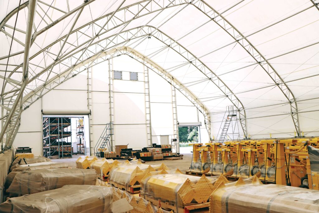 inside fabric truss building protecting stored goods