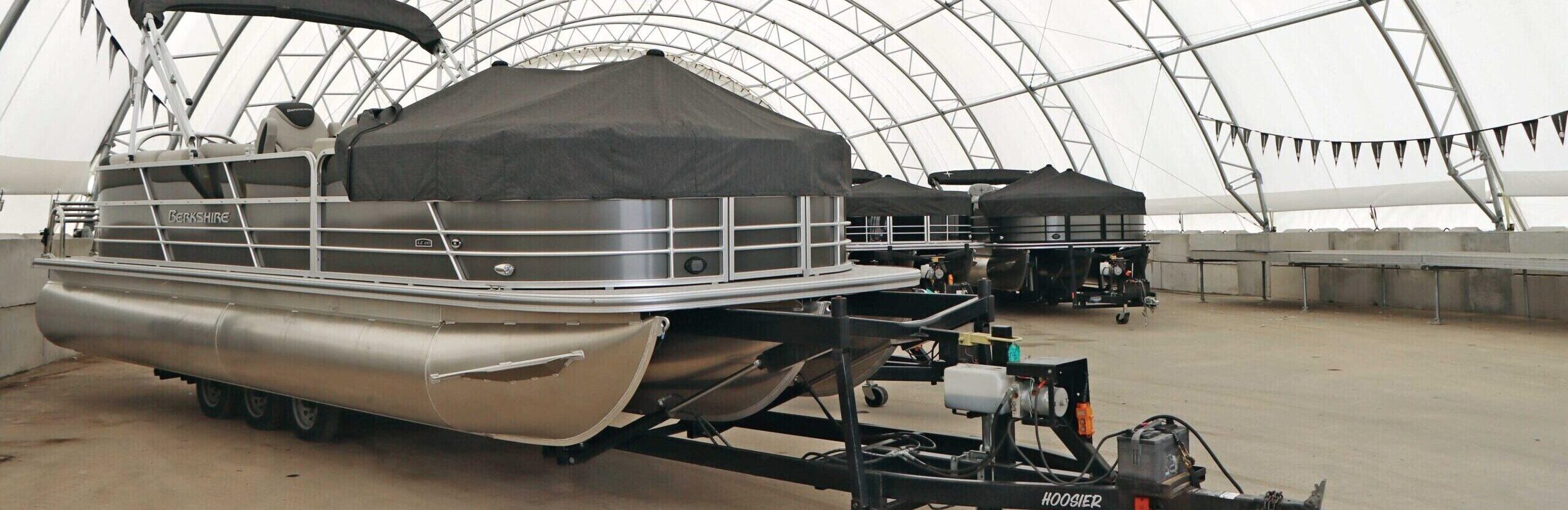 boats inside fabric marina storage structure