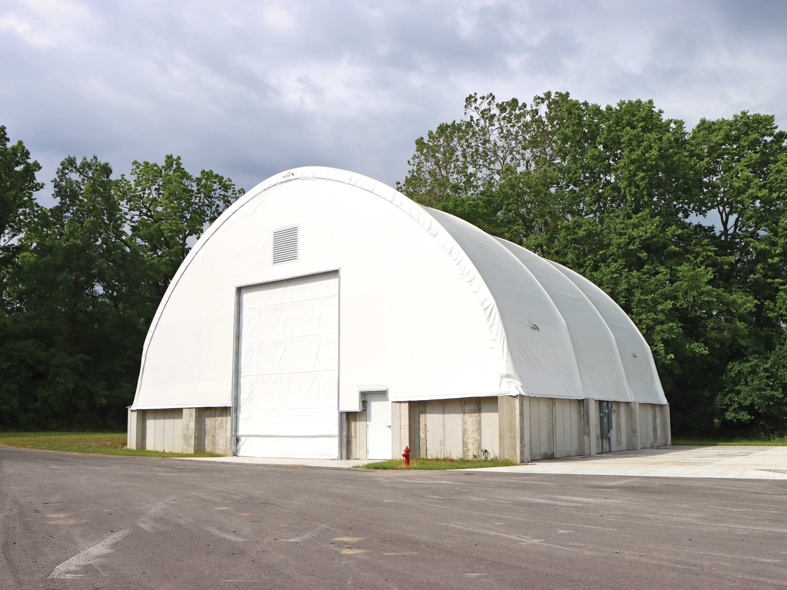 fabric commercial modular building on concrete foundation