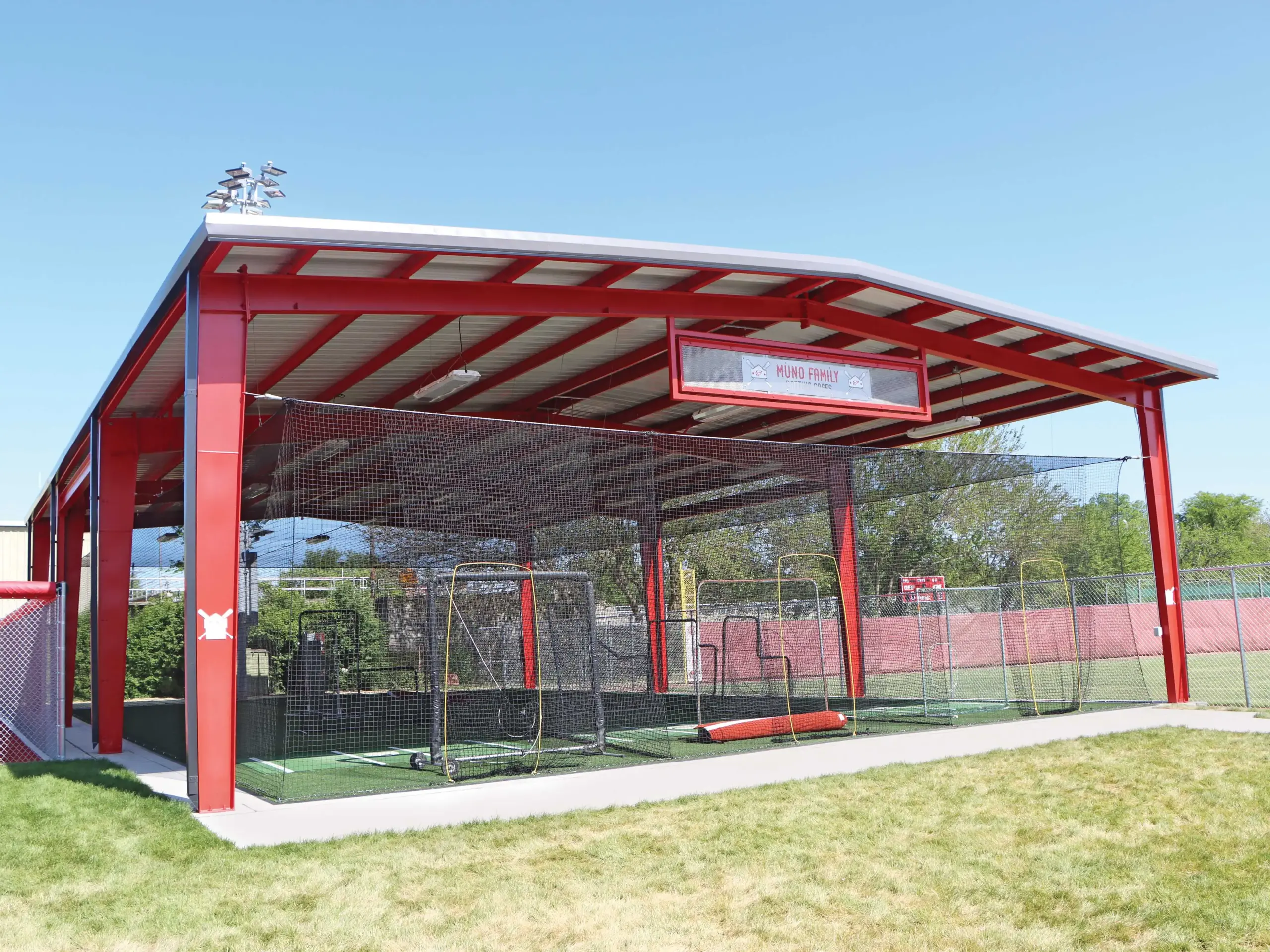 metal building with an I-beam frame painted red