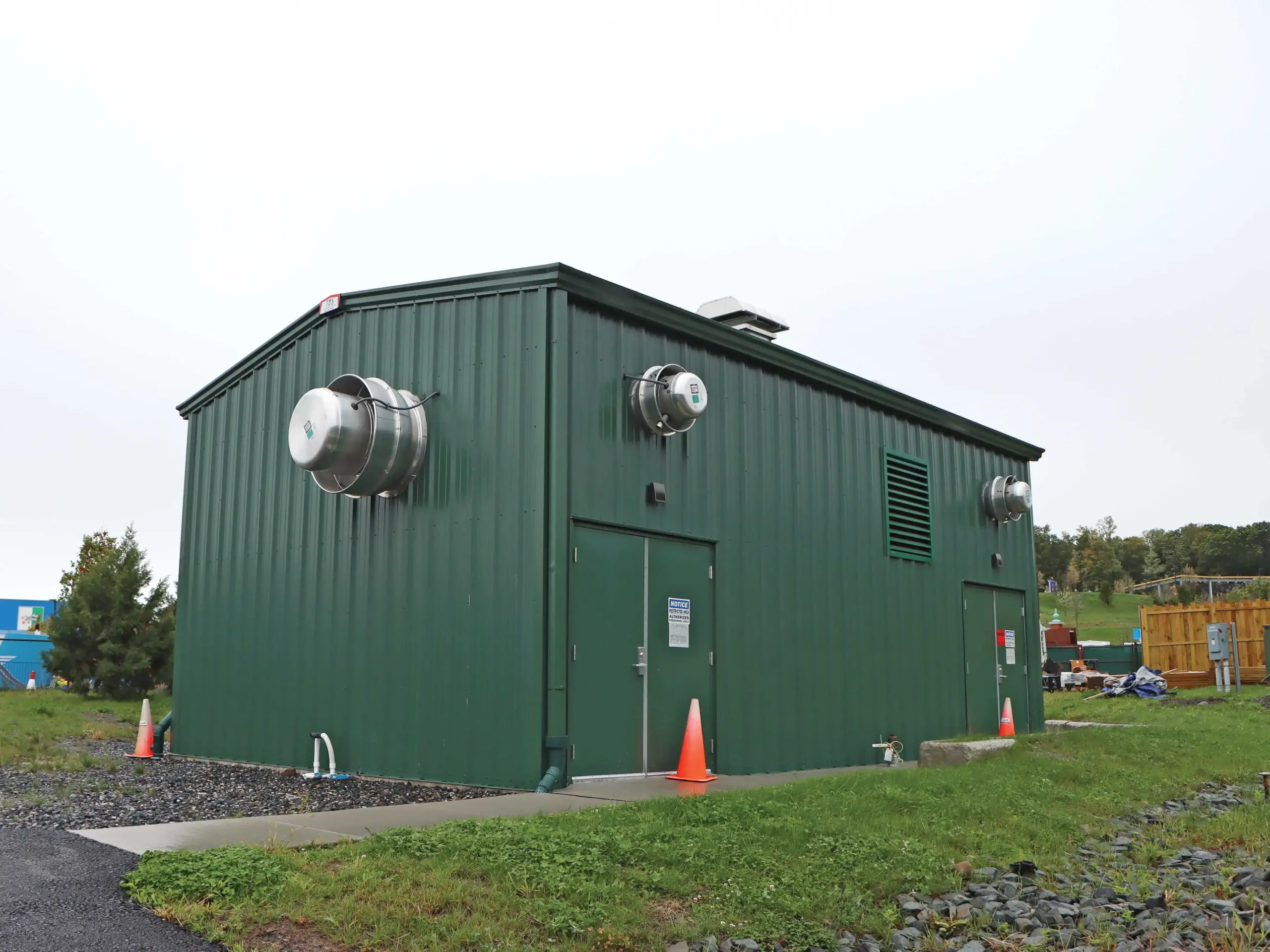 green metal cladding on exterior of structure