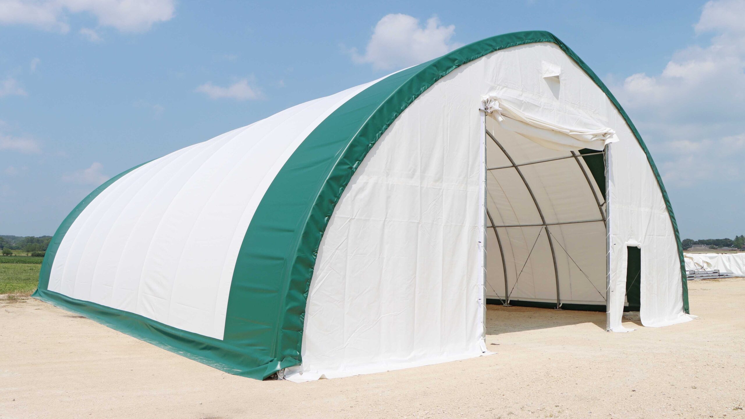 White and green fabric storage shed