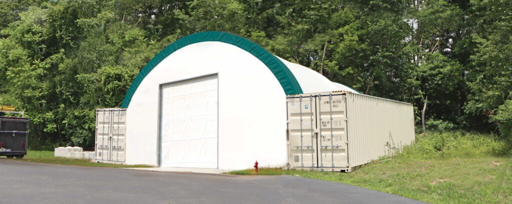 fabric shed mounted on storage containers