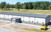 commercial building construction nearly finished on metal building