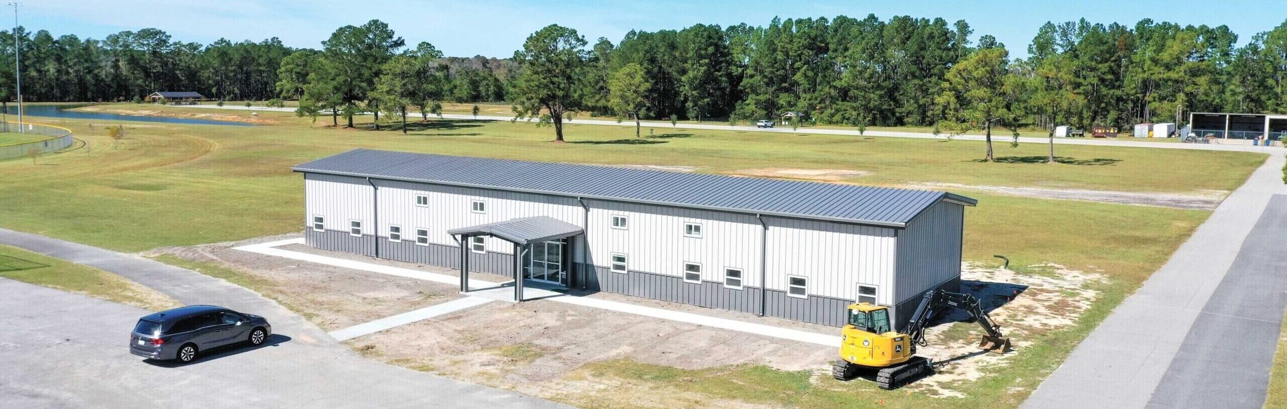 commercial building construction nearly finished on metal building