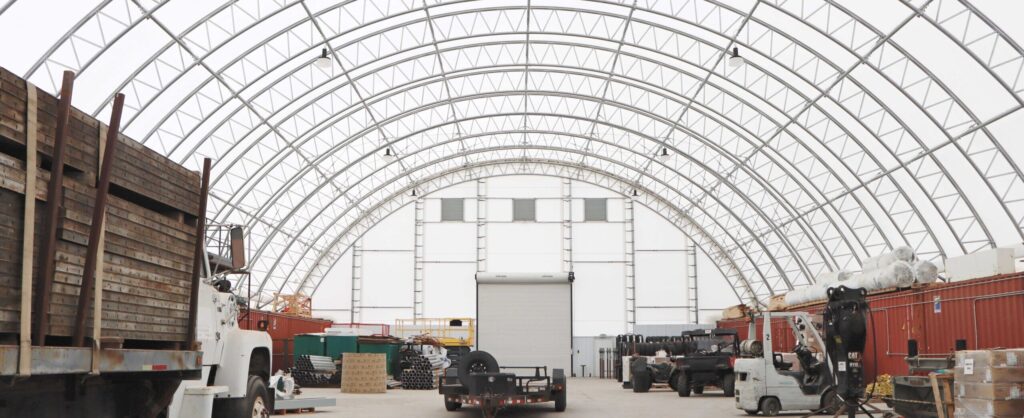 ClearSpan HD Container Buildings are the ideal storage solution for industrial operations. At Mountain West Electric in Idaho, the structure provides wide-open, secure space for vehicles, equipment and large amounts of inventory.