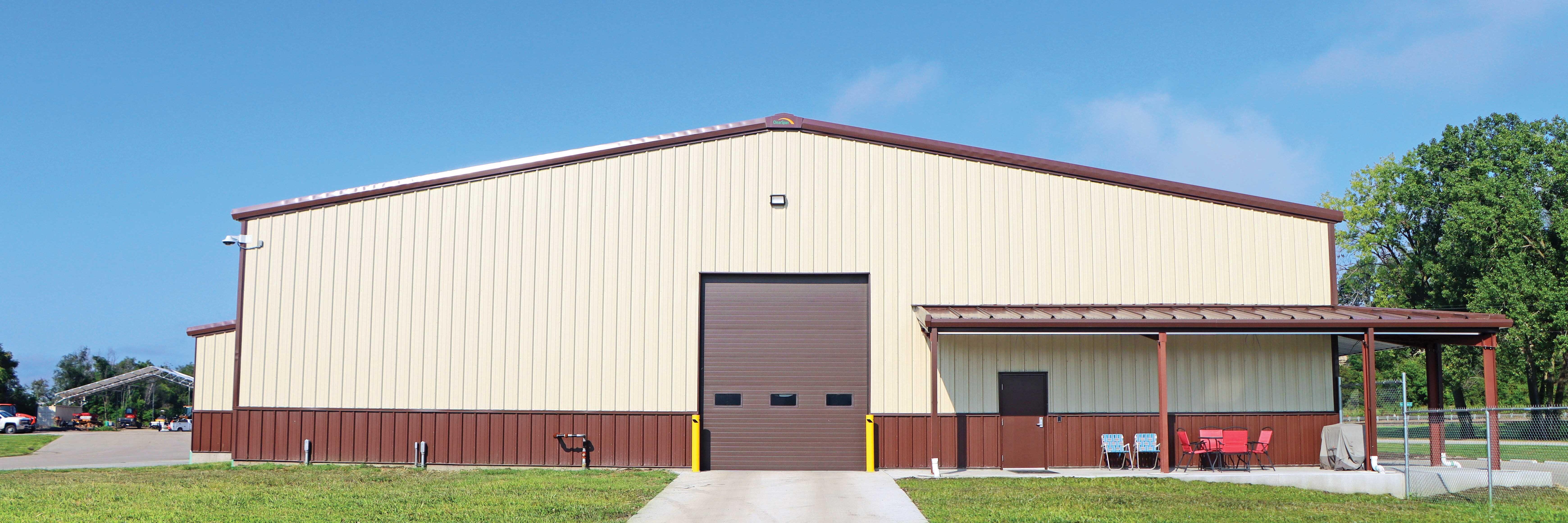 Exterior end wall of a ClearSpan PEMB with a garage door